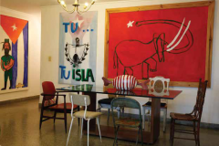 The vintage desk in JEFF’s office displays a collection of toys and doll parts, antique radios, and typewriters as well as the once-ubiquitous Soviet-era Orbita table fan.