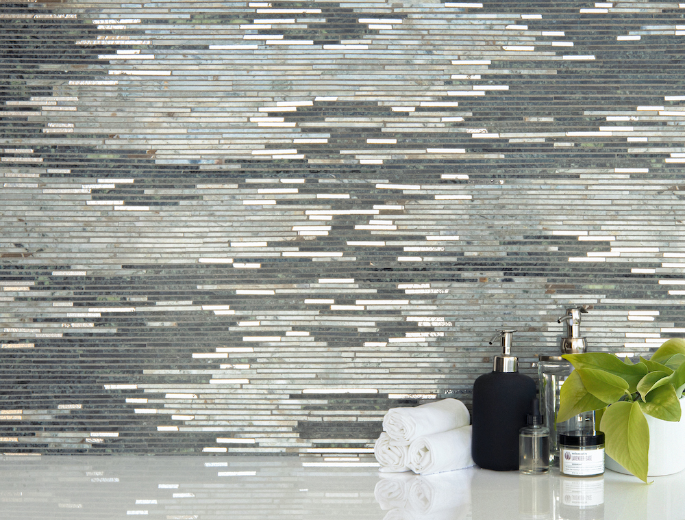 Reve Forest, a hand-cut stone mosaic, shown in polished Mercury, Lichen and Oyster, is part of the Heritage Collection by New Ravenna.
