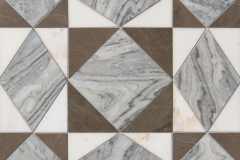 Palatium, a waterjet stone mosaic, shown in honed Calacatta Monet, Thunderhead, and Mink, is part of the Heritage Collection by New Ravenna.