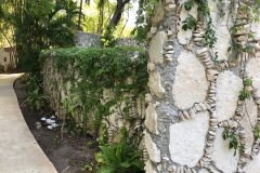 Stone-chip-encrusted wall, Mahekal Resort, Mexico