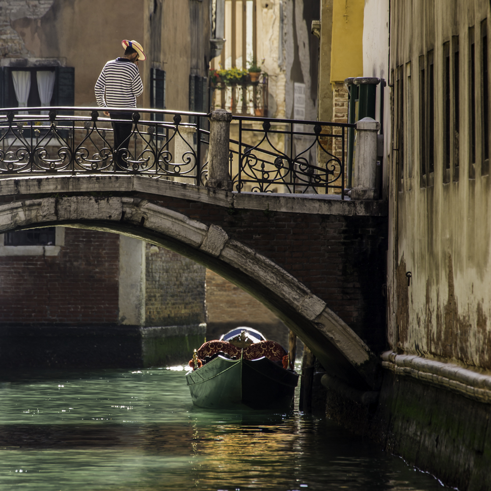 Gondolier on Bridge, Venice, Italy