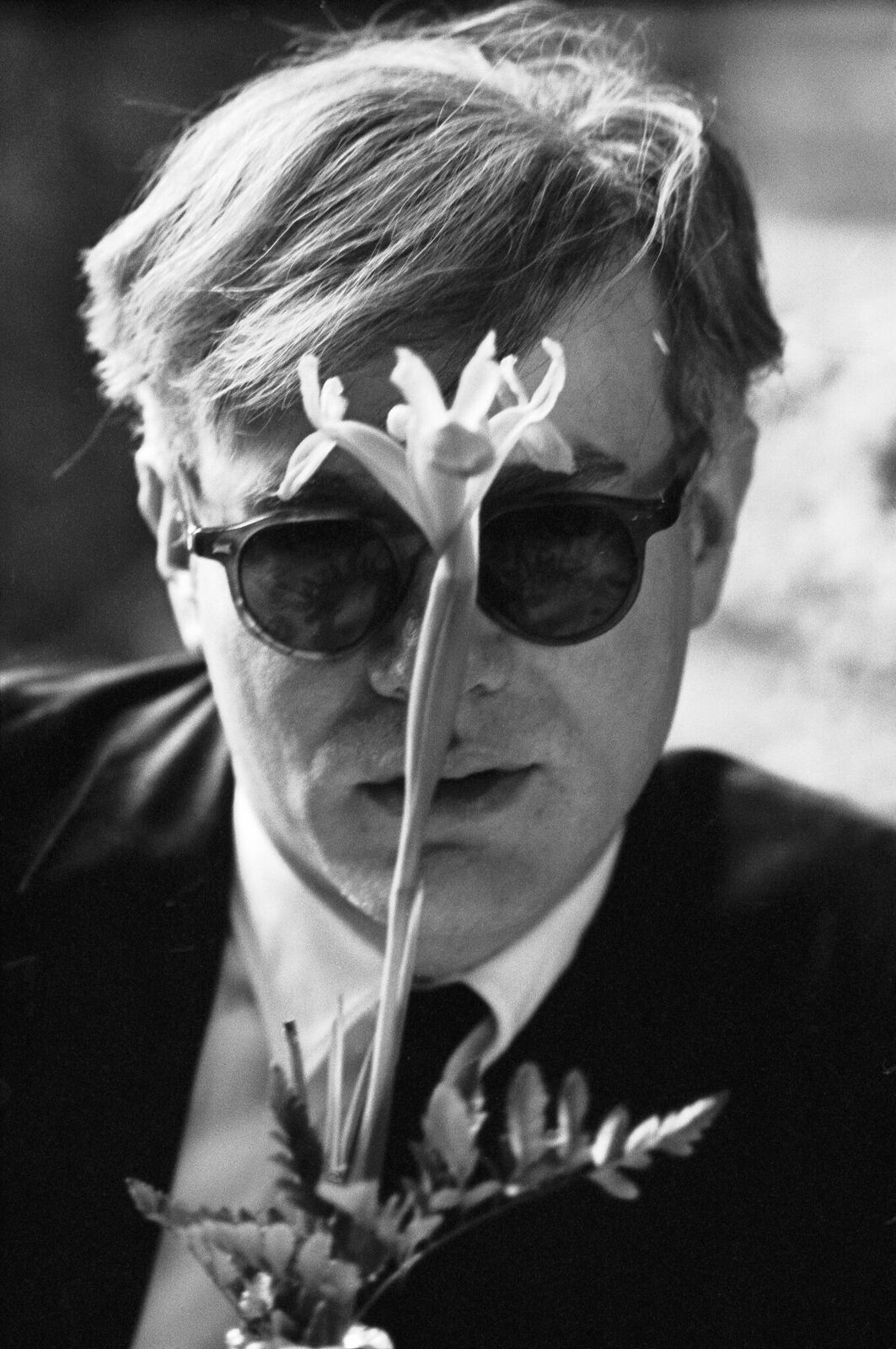 Dennis Hopper, Warhol with Flower, 1964, Iris print.The Andy Warhol Museum, Pittsburgh; Gift of Jay Reeg 2011.3.1 © Dennis Hopper, Courtesy of The Hopper Art Trust.