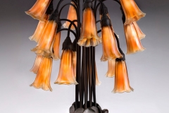 Tiffany Glass & Decorating Company, Eighteen-Light Lily Table Lamp , prior to 1902, bronze, blown glass. Photograph by John Faier. © 2013 Driehaus Museum