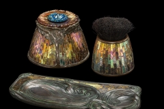 Pen wiper. Tiffany Studios; “Poppy” inkstand. Tiffany Glass&Decorating Company; Pen tray in “Swirl” pattern. Tiffany Glass&Decorating Company or Tiffany Studios.