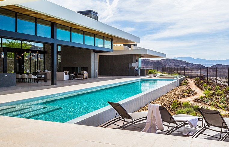 Sure, Sinatra, Dino and Sammie would be happy in the home designed by hospitality specialists at SB Architecture. Who wouldn’t be? These architects are packing hotel amenities into a private residence.
