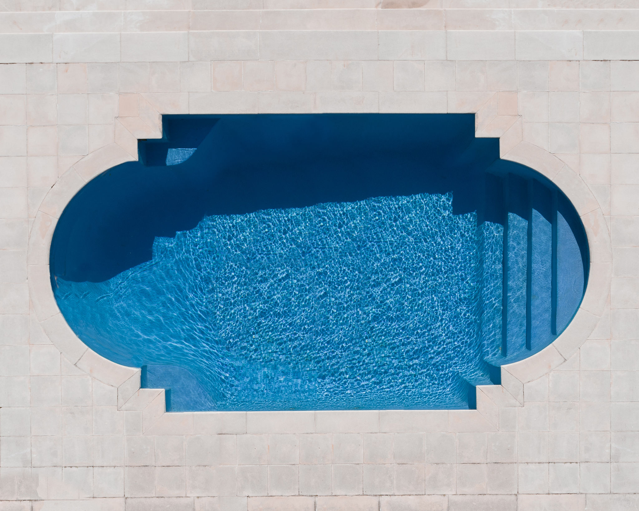 He recently released a new series of photos – an ode to the beauty found in the shapes, colors, and textures of swimming pools.
