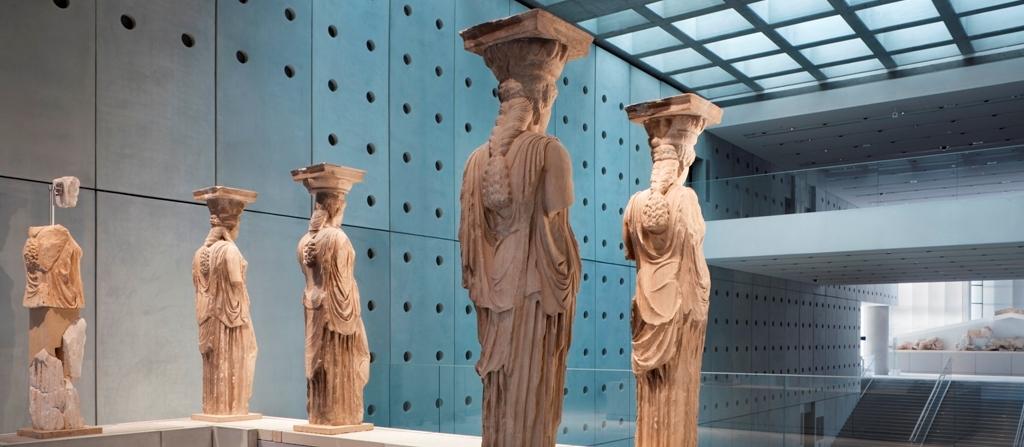 First, design and build a new museum in Athens, Greece to house a national collection of precious artifacts, including the original frieze from the Parthenon, which still stands on the Acropolis 300 yards away.