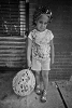 Child in curlers holding balloon72