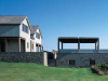a-simple-stone-wall-forms-its-own-multifunctional-property-line