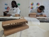 7-studio-h-students-jamesha-thompson-and-rodecoe-dunlow-at-work-in-the-studio-from-if-you-build-it-a-long-shot-factory-release-2013