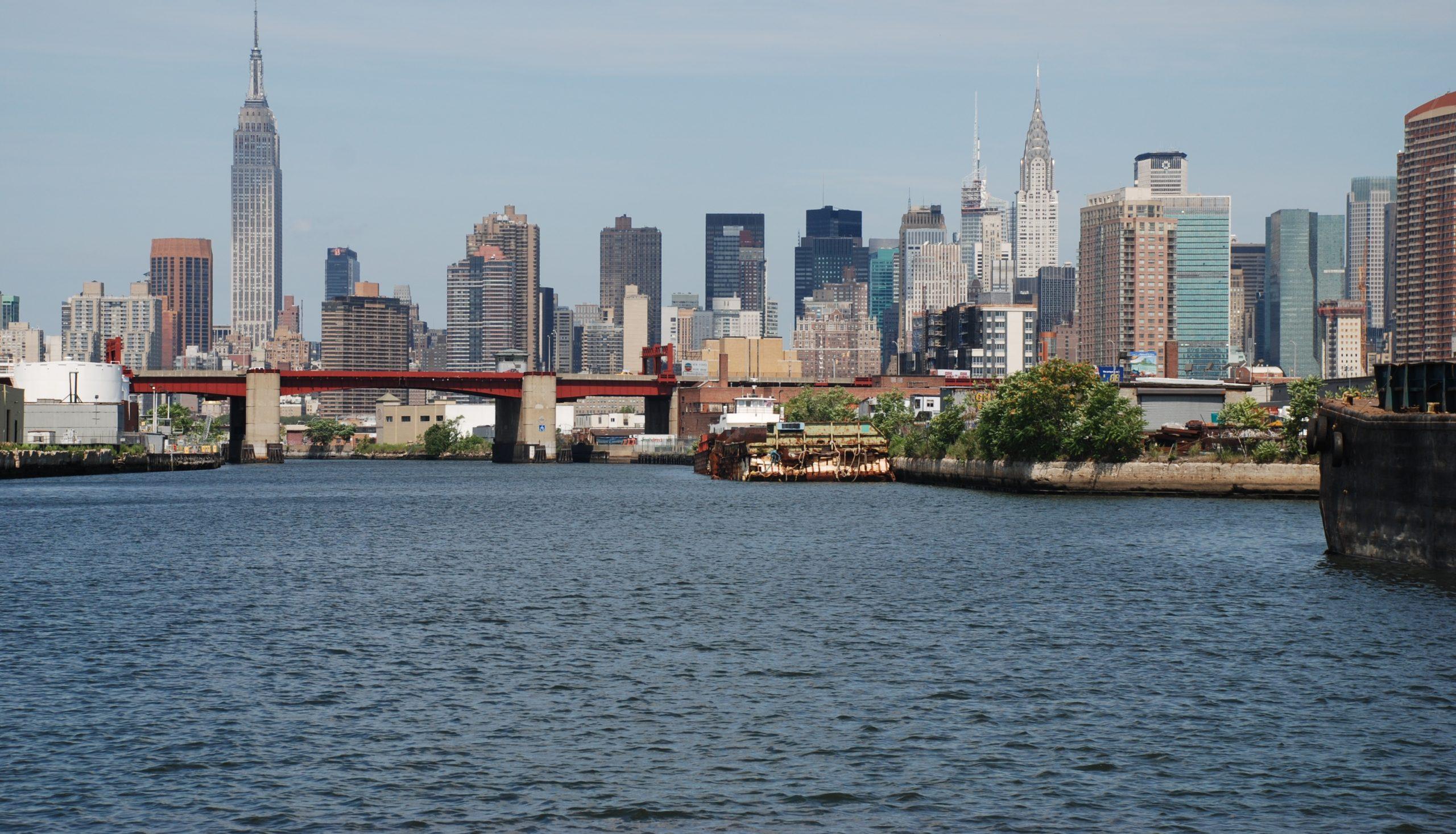 Named for a tributary that feeds into the East River and separates Brooklyn from the Queens, the waterfront site offers spectacular views of mid-town Manhattan.
